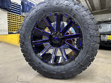 FUEL Off-Road Contra black gloss with blue trim wheel installed with Toyo Open Country tire in Richmond, VA